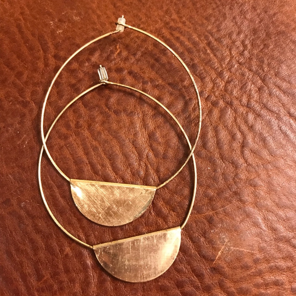 Brass half moon hoop earrings.